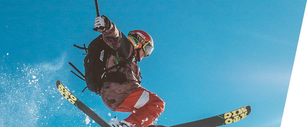 A skier flying off a jump
