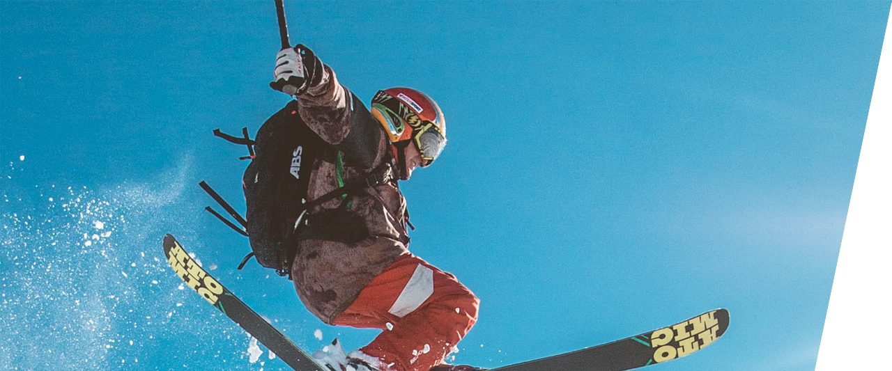 A skier flying off a jump